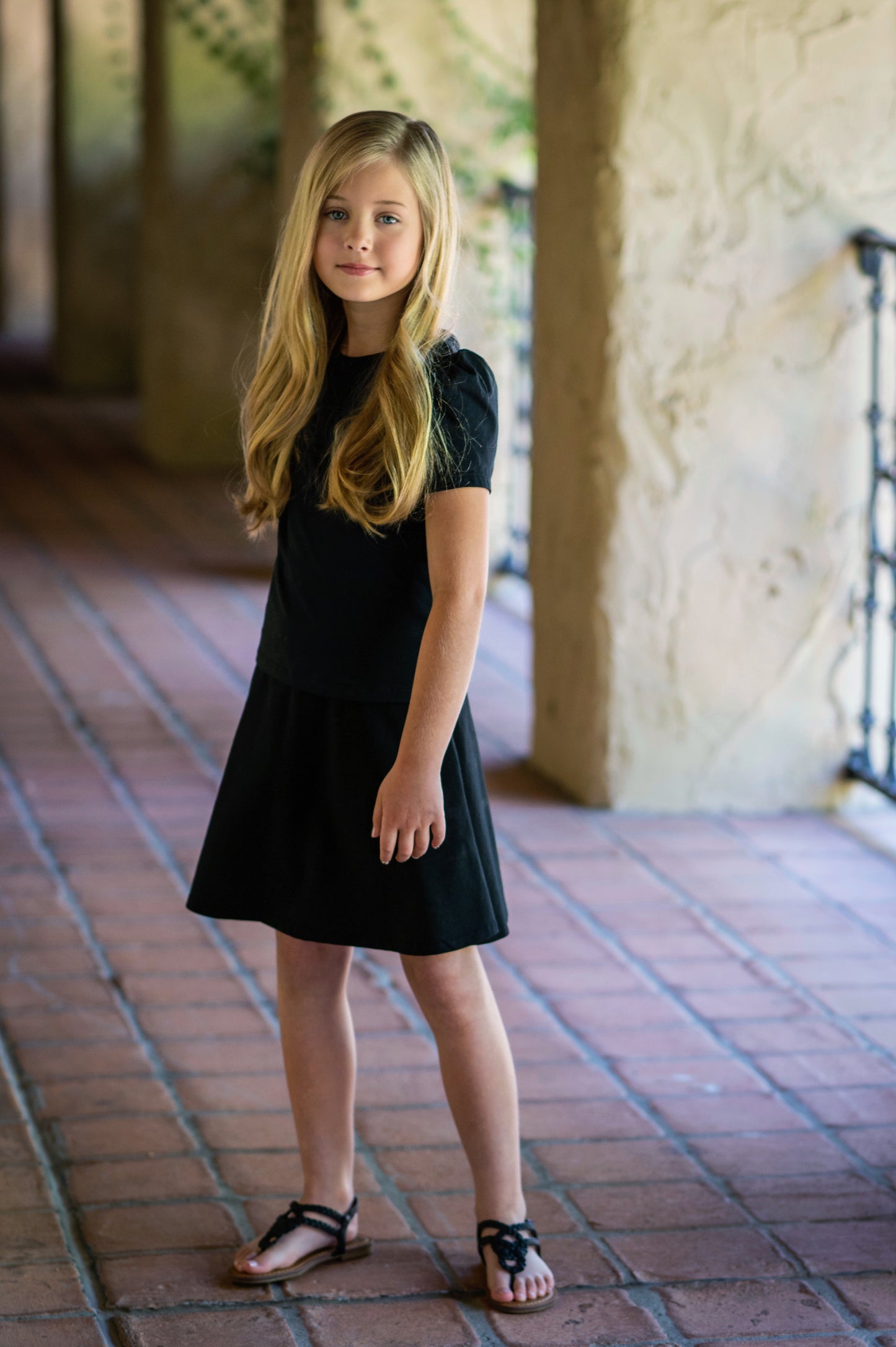 Girl wearing our back short sleeve t-shirt