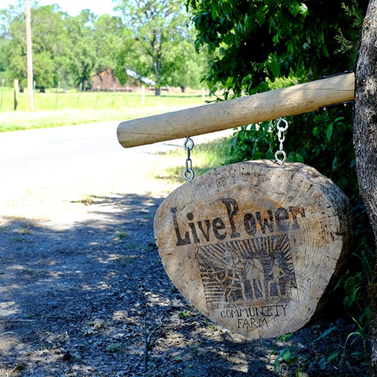 Sign of Live Power community farm