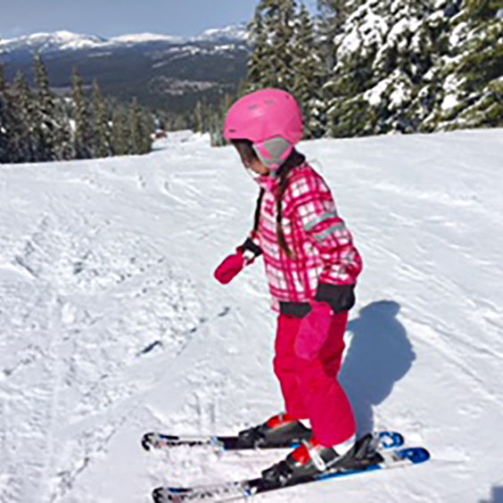 Founder of Classic Girl's daughter in pink ski outfit