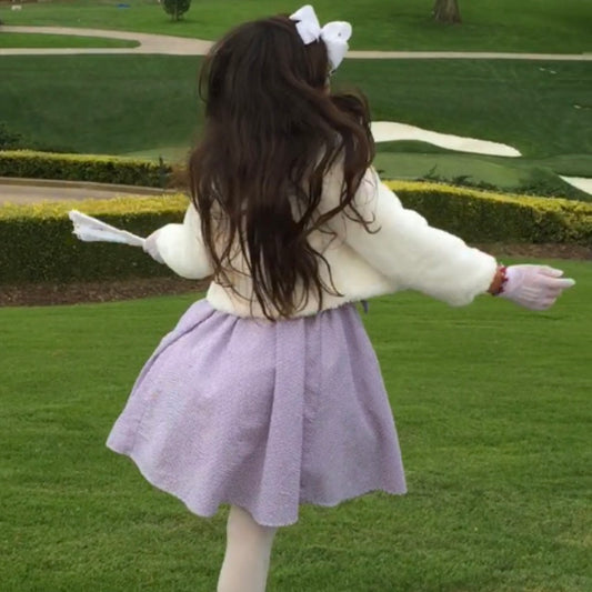 Classic Girl's daughter in the Picnic dresses jumping